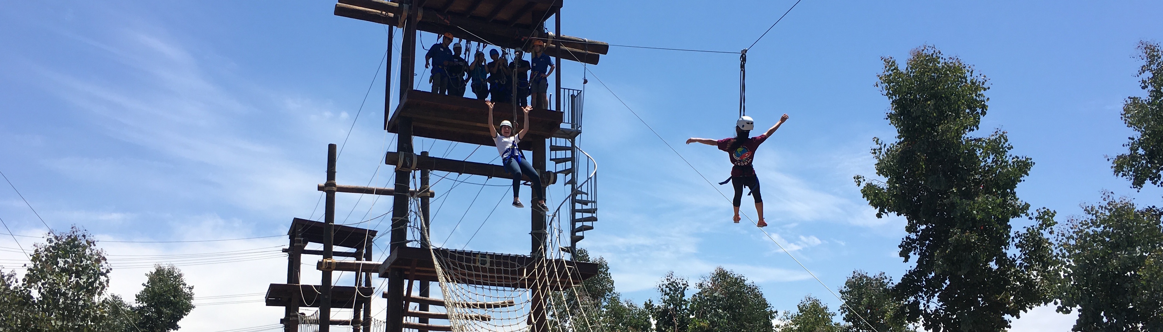 tw students zip-lining at UCSD's Ropes course